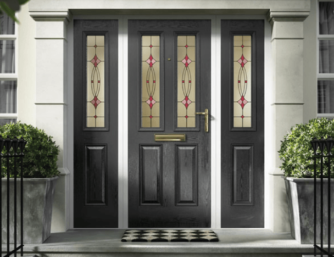 GRP composite door in black with red and pink glass inlay